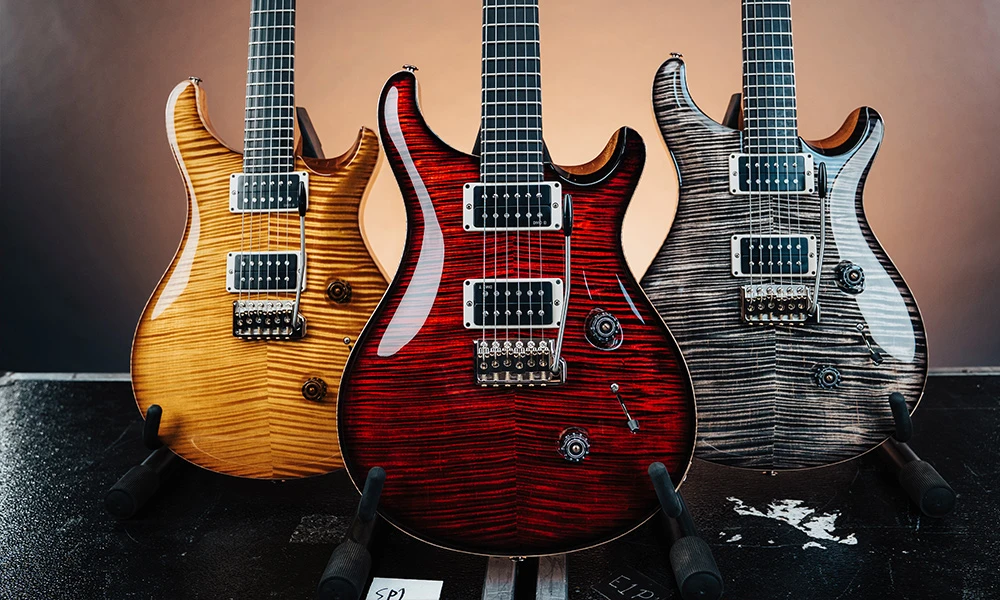 PRS Custom 24 Birds of a Feather Blood Red Charcoal Microburst és Honey Gold színekben